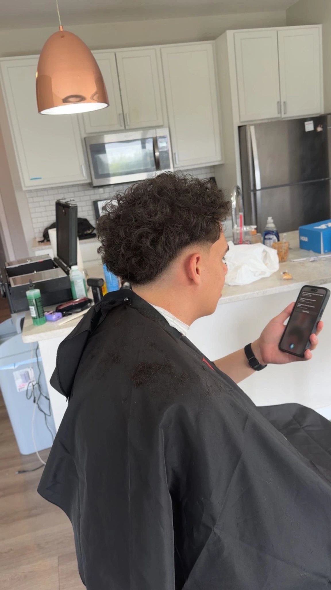 Curly haircut and fade by Jassem